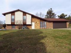 Nice updated 3 bedroom 2.5 bath home. 2 car oversized garage. Great backyard with large deck. Inviting living room with coat closet. Kitchen with pantry & ceramic tile backsplash. Family room with brick gas fireplace & walk-out to nice 2 tiered deck. Owners suite with full bath. Convenient location. Close to Bridgewater Falls & Liberty Center shopping malls, parks, schools, entertainment & highways. UPDATES: NEW FURNACE 2017. NEW ROOF 2012. NEW WINDOWS 2009. NEW GARAGE DOOR & GARAGE DOOR OPENER 2015. NEW CARPET LIVING ROOM, BEDROOM 2, 3 & HALLWAY 2017. OWNER'S BATH NEW TUB/SHOWER INSERT 2017. NEW CERAMIC TILE TUB SURROUND, CERAMIC TILE FLOOR & FIXTURES 2ND FULL BATH 2015.