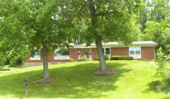 Welcome Home! This wonderful brick ranch sits in the perfect location, at the end of a cul-de-sac. It is an extremely private setting which is wonderful for entertaining or simply enjoying a glass of your favorite beverage. Well established trees provide plenty of shade in this area of million dollar homes. Don't be afraid take a look, you'll like what you see!