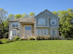 Impressive brick home offers over 3,000 square feet of living space and was custom built by Bryan Schmidt Builders for the current owner.