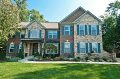 This picture perfect front has been freshly painted and landscaped. Walkway and porch were recently updated with indian stone.