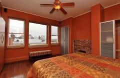 Wake up in the Master Bedroom with a view of the city! The Master Bedroom is accented by the charming hardwood floors and decorative fireplace. A ceiling fan will provide a cool, gentle breeze.