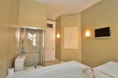 From this angle you can see the large shower and a TV to keep you informed as your are getting ready for the day.