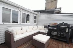 Get comfortable on the rooftop desk as you relax on the couch and take in the views of the city. Barbecues are a must no matter the season!