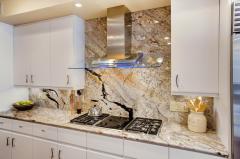Gas stove, granite backsplash!