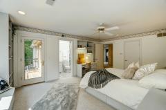 2nd floor rear center bedroom. Full bathroom adjoins! Walkout to balcony! Built in, 2 closets & storage galore.