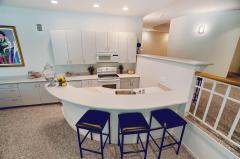 Lower Level!!!! Kitchen! Storage! View of pool!