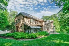 Beautiful rear view! Architecture by Larry Norris, Built by Arthur Brand with Interior Designer David Millett managing everything from the unique ceiling detail in every room to the Kinsella custom cabinetry!