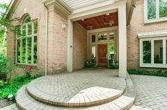 Welcome! Hand carved wooden door! Immediate occupancy Architecture by Larry Norris, Built by Arthur Brand with Interior Designer David Millett managing everything from the unique ceiling detail in every room to the Kinsella custom cabinetry!