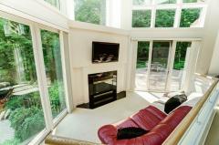 View, doors open to patios, fireplace...what can be more cozy!
