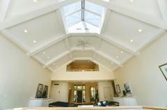 Architectural ceiling. Skylights! Recessed lighting! Ceiling fan! 2nd floor overlook!