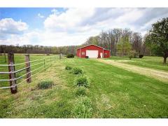 Located on Property #2, this barn with paddock is perfect for horses or other large animals.