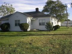 Closer View of Front Exterior of House. House is much bigger (over 2400 s.f.) than it appears in photos.