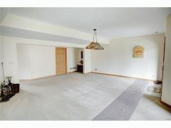 Plenty of space for a Pool Table. Overhead light already in place for you.