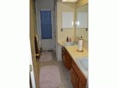 Hall bath, double vanity, tub/shower & water closet room