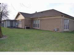 Rear view from east to west w/ Florida Room and 9x18' patio