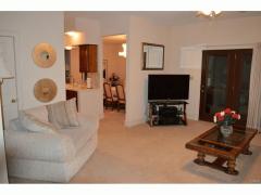 Family room open to kitchen & dining room and door to Florida Room