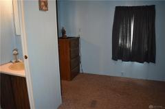 Front bedroom with 1/2 bath