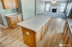 Kitchen island. The great room is to the rear.