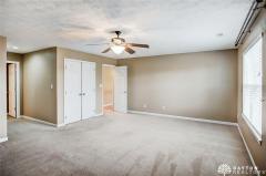 Master bedroom looking toward the hall. The double door is the walk-in closet. To the left is the luxury bathroom.