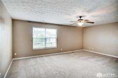 Another view of the master bedroom looking from the hall door.