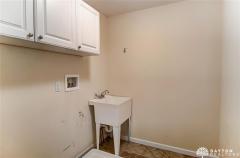 2nd floor laundry has ceramic floor.