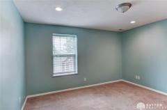 Another view of the basement spare bedroom with egress.