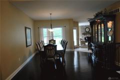 Dining room features hardwood floor and over looks patio and great room.