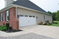 Over sized 2 car garage with space above for storage.