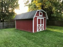 18x12 Shed on a slab. Electric & lighting inside & overhead storage.