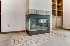 Wood burning fireplace in master bedroom