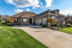 Sprawling ranch with finished lower level, bar, open family room and storage galore! Beautiful setting backs up to pond and green space !!!