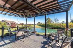 Backyard paradise!!!! Pond/ Green space! Custom Deck!!!