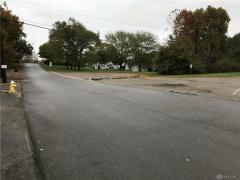 Parking on both sides of Auburndale Ave. extends to street past the line of 4 trees.