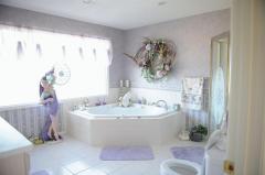 Large bath with Jacuzzi tub and shower.