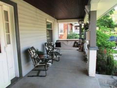 Large covered inviting front porch is a great place to entertain family and friends. Who would not enjoy a swing on the front porch!