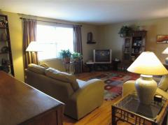 Large room, upper level of the secondary building. Hardwood floors. Insulated windows. 936 SF on the upper level.