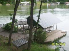 Multi use dock, 2 slips, 2 sitting areas and safe swim area with diving board.