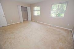 Dual windows and walk-in closet in this spacious master bedroom