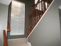 Open stairs lead to loft/bedroom