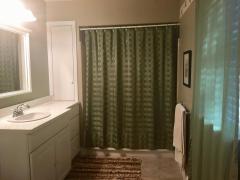 Gorgeous Master boasts of master bath, handicap accessible walk out, window treatments and a spacious closet.