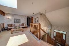 The loft area overlooks the great room and has sofas for a nice quite area.