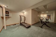 The exercise room has built-in TV and lots of mirrors and is carpeted.