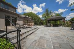 The home opens out from the Great Room by French doors and also French doors open from the kitchen to the huge patio and gazebo that is a great place for entertaining.