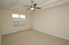 Owner's Suite with ceiling fan