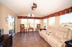 Walls of Windows to enjoy the view and a walk-out to the Huge Deck makes this room so appealing.