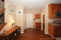 The Lower Level includes two full baths, plus access to storage space. There is also a first floor Laundry Room and Laundry hookups in the lower level.