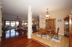 Decorative columns give some definition to the Dining Room, yet it is open to the rest of the home.