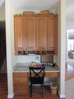 Nice built-in planning desk in the kitchen area.