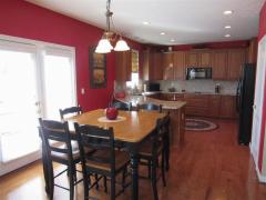 Breakfast area with walkout to the patio.