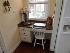 Also in the kitchen is this useful planning desk area. Granite.